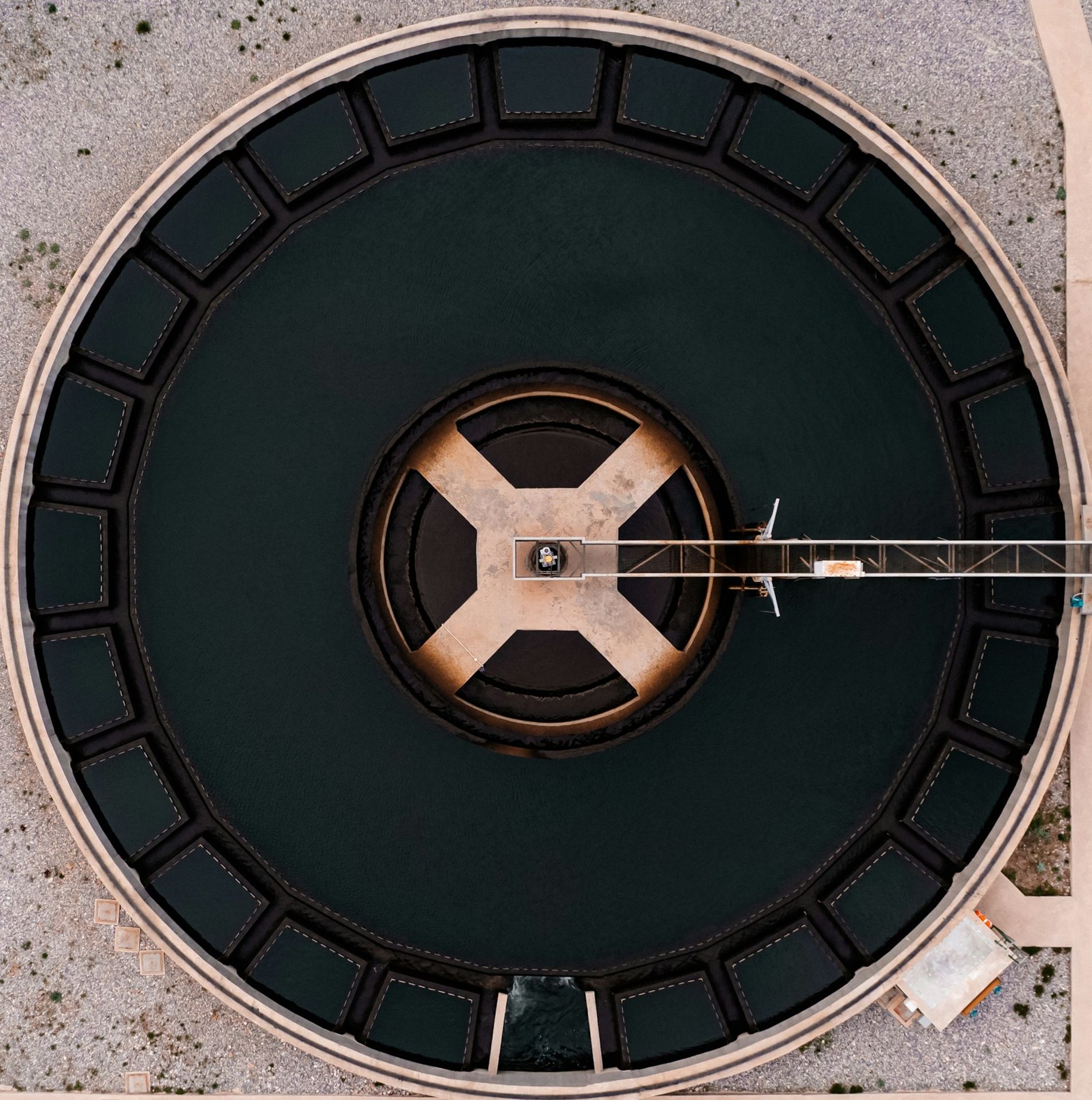 an overhead view of a circular metal structure